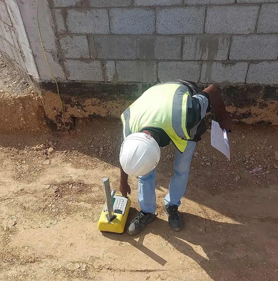 Field density test on compacted fill