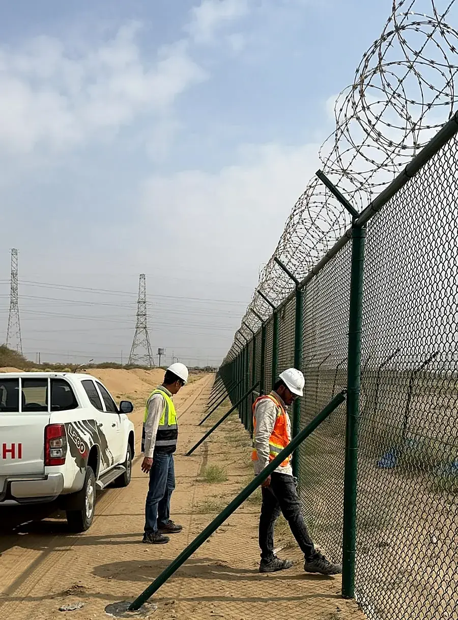 Fence alignment check along the plant boundary